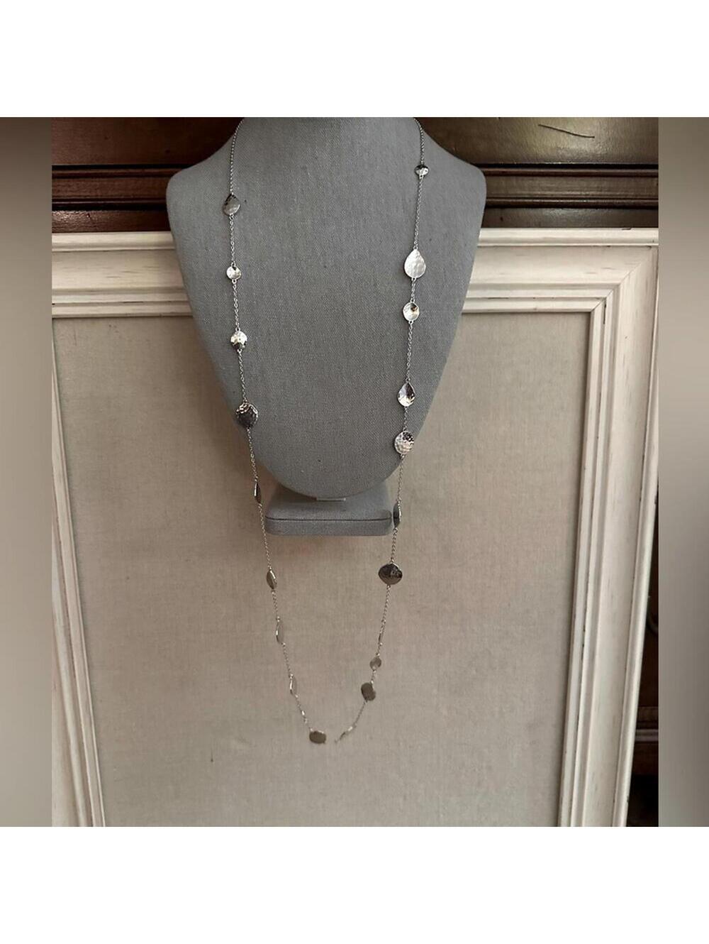 Melinda Maria Long shiny silver tone necklace with hammered silver discs. NWOT